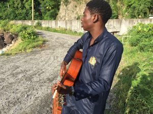 Olugbebga Ayodeji Ebeneze Playing Guitar